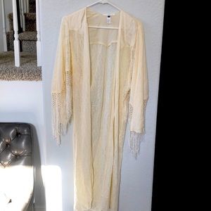 Cream fringe cover. Great for festivals!! Or bathing suit cover.